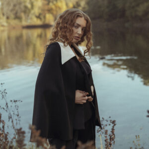 Black Pant Suit with a Detailed Corset and White Accent Trim on Blazer