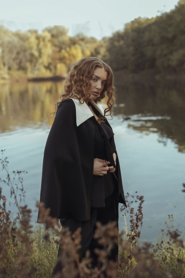 Black Pant Suit with a Detailed Corset and White Accent Trim on Blazer