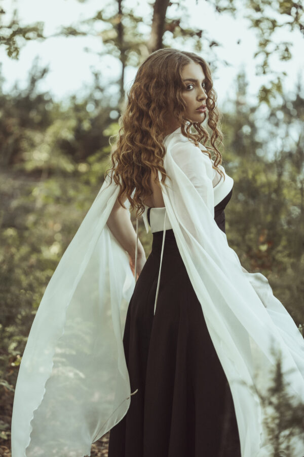 Long Black Gown with White Top Trim and White Shoulder Overlay Cape