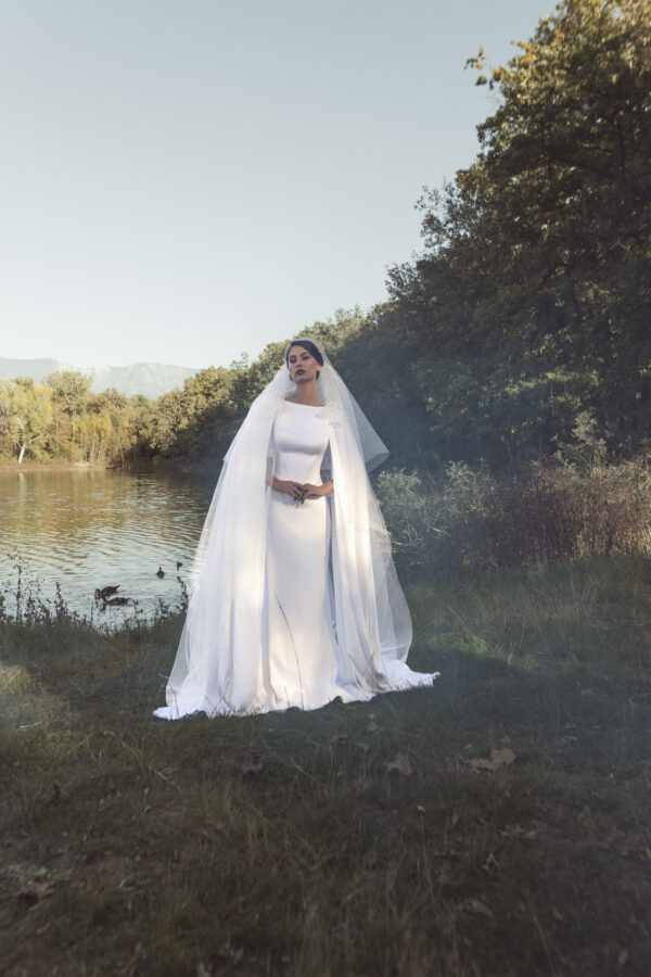 Long White Wedding Dress with Veil and Flower Details - Image 2