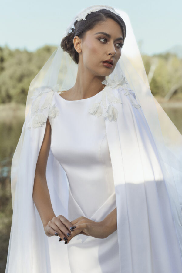 Long White Wedding Dress with Veil and Flower Details - Image 4