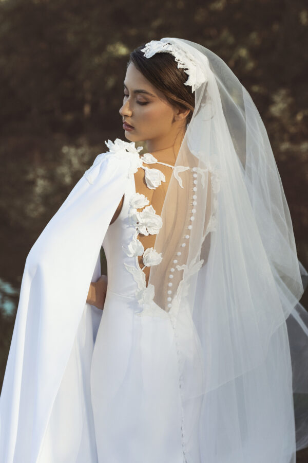 Long White Wedding Dress with Veil and Flower Details - Image 3