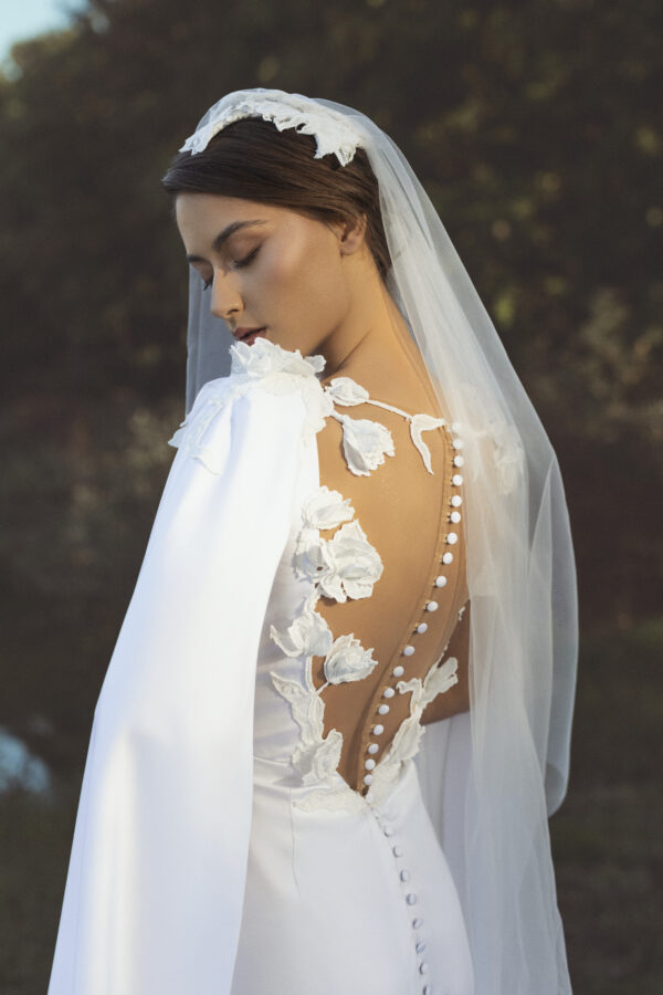 Long White Wedding Dress with Veil and Flower Details - Image 5